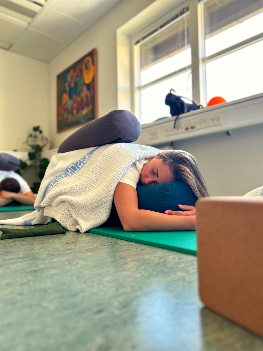 Participant resting during a group session at DIGNITY